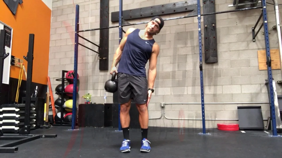 آموزش حرکت کرانچ از پهلو با دمبل - آموزش با فیلم و عکس